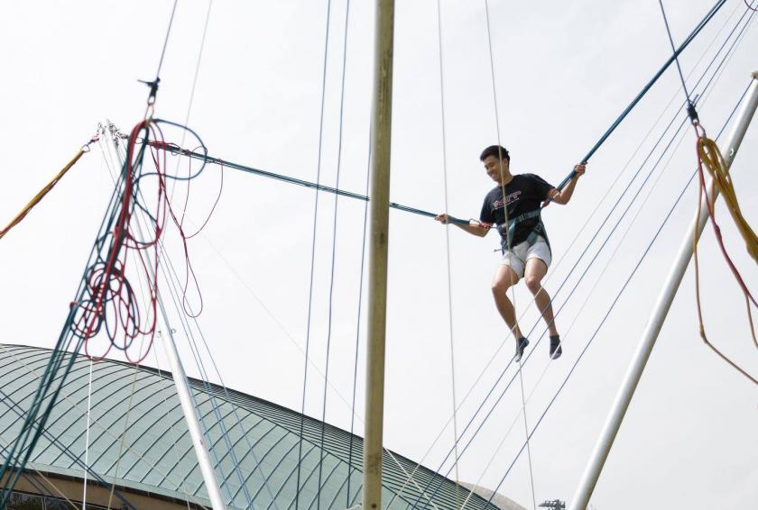 student engaging in bungee activity