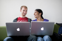 two people with computers